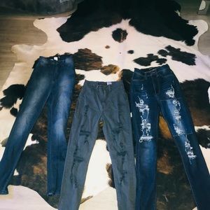 Denim jeans 4 of which are from FASHION NOVA.